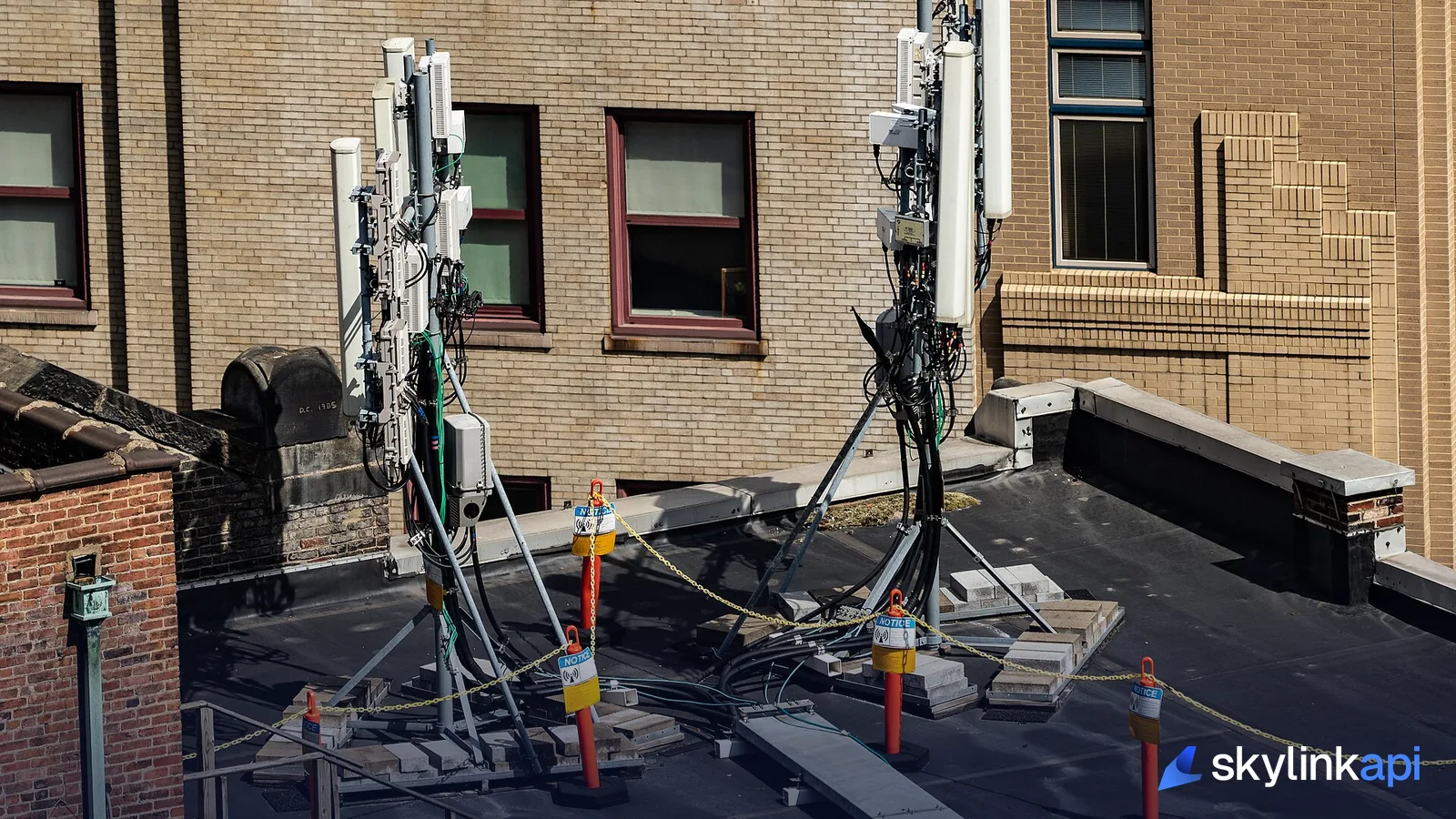 Antennas and cabling mounted on a city rooftop