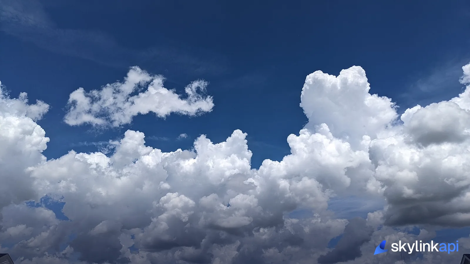Cumulus clouds against a blue sky — the cloud layers a METAR reports