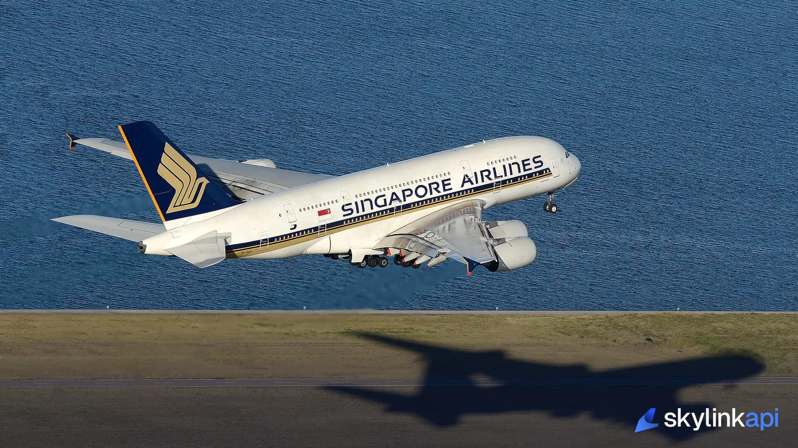 A Singapore Airlines Airbus A380 climbing after takeoff, a large wide-body burning fuel across a long-haul sector