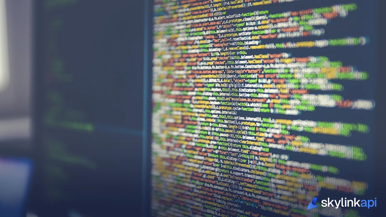 Syntax-highlighted source code on a monitor, the kind of detection logic described in this article