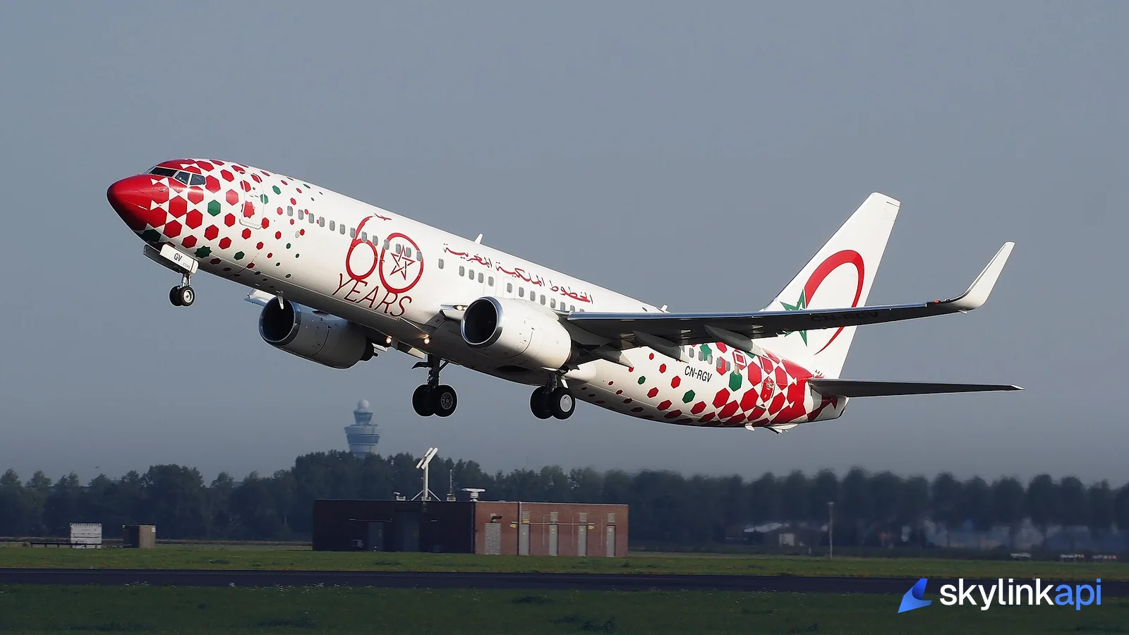 A Royal Air Maroc Boeing 737 lifting off the runway with its landing gear still extended