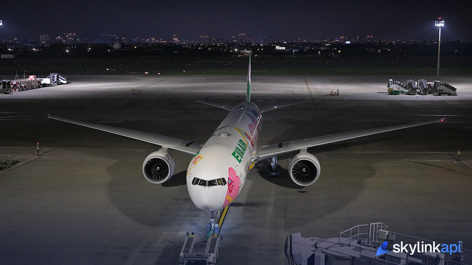 An airliner pushing back off-gate for a scheduled departure