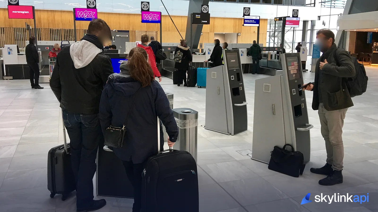 A check-in hall with passengers