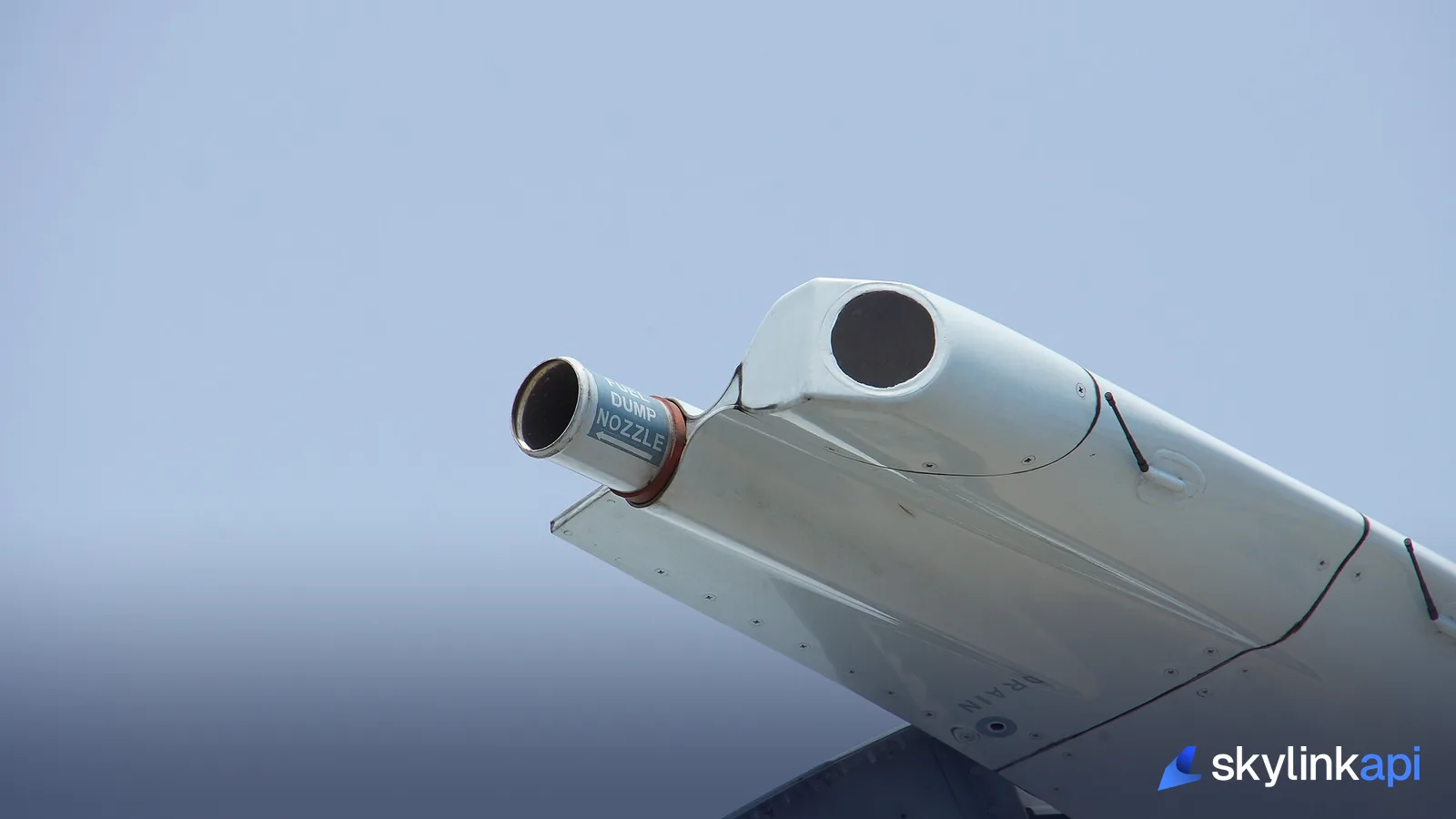 A wingtip fuel-jettison nozzle — the outlet a jet dumps fuel through