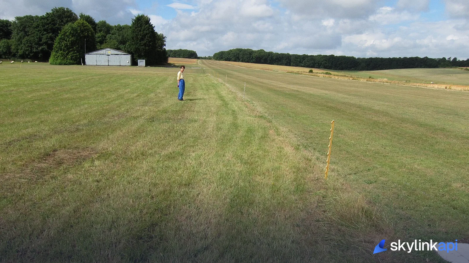 A grass airstrip at a small rural airfield