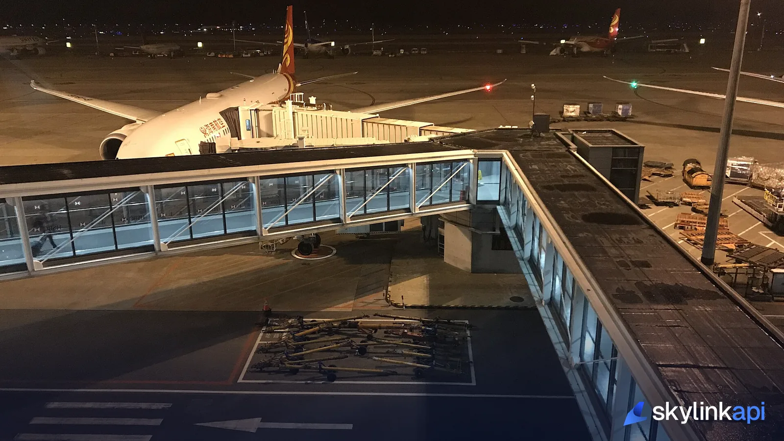 An aircraft at a boarding gate