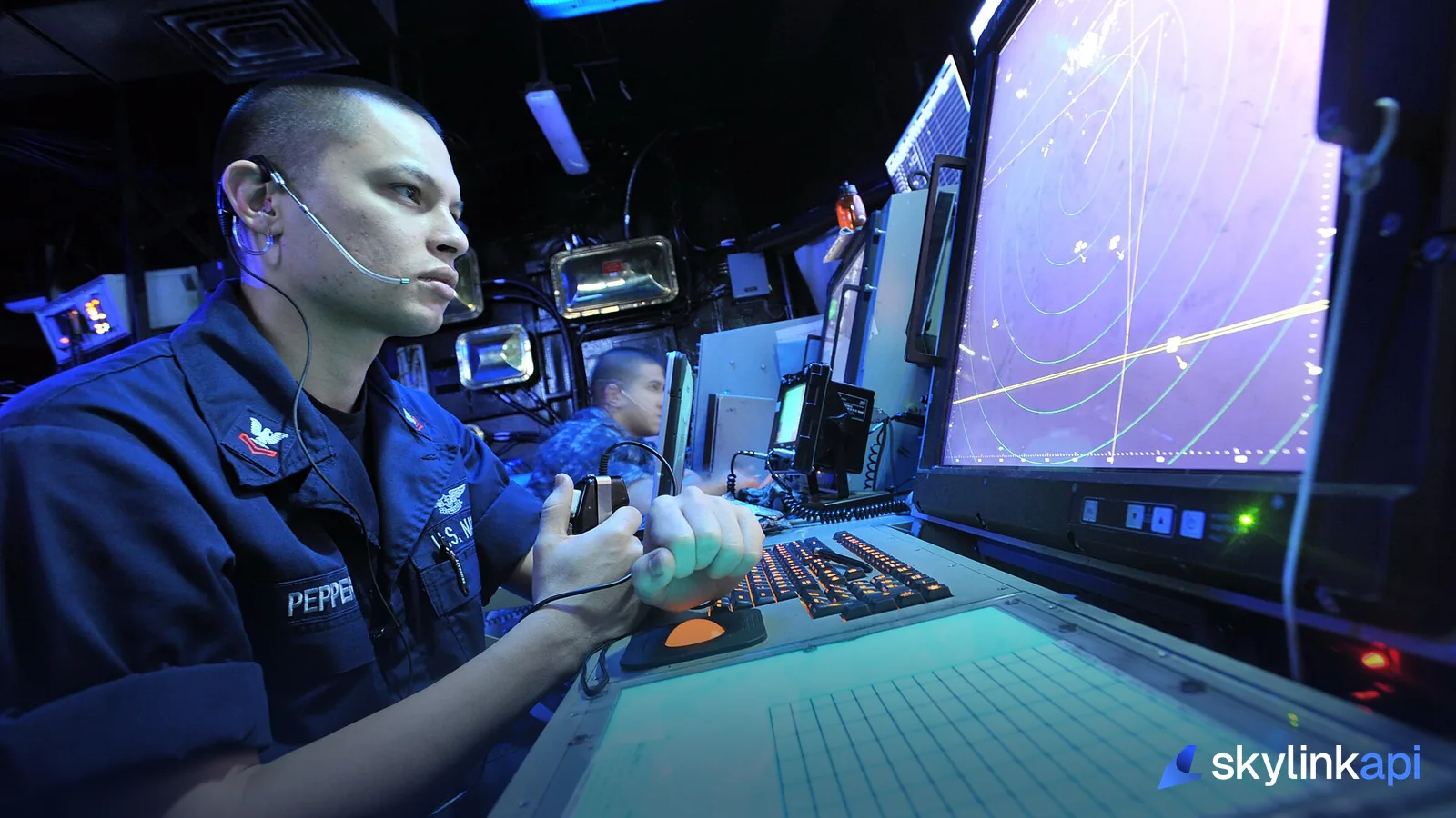 An air traffic controller working a radar display