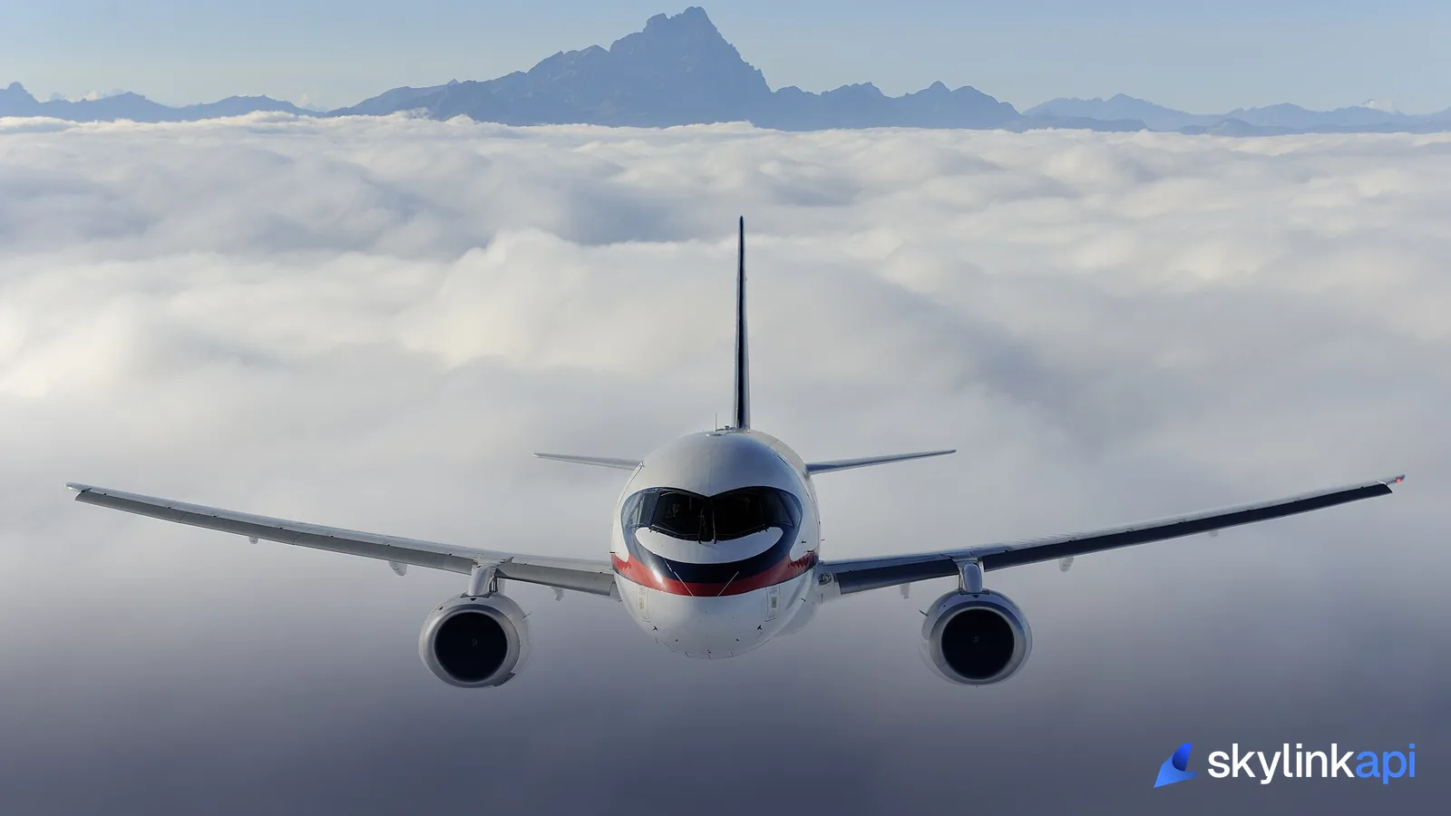 An airliner at cruise above a solid deck of cloud