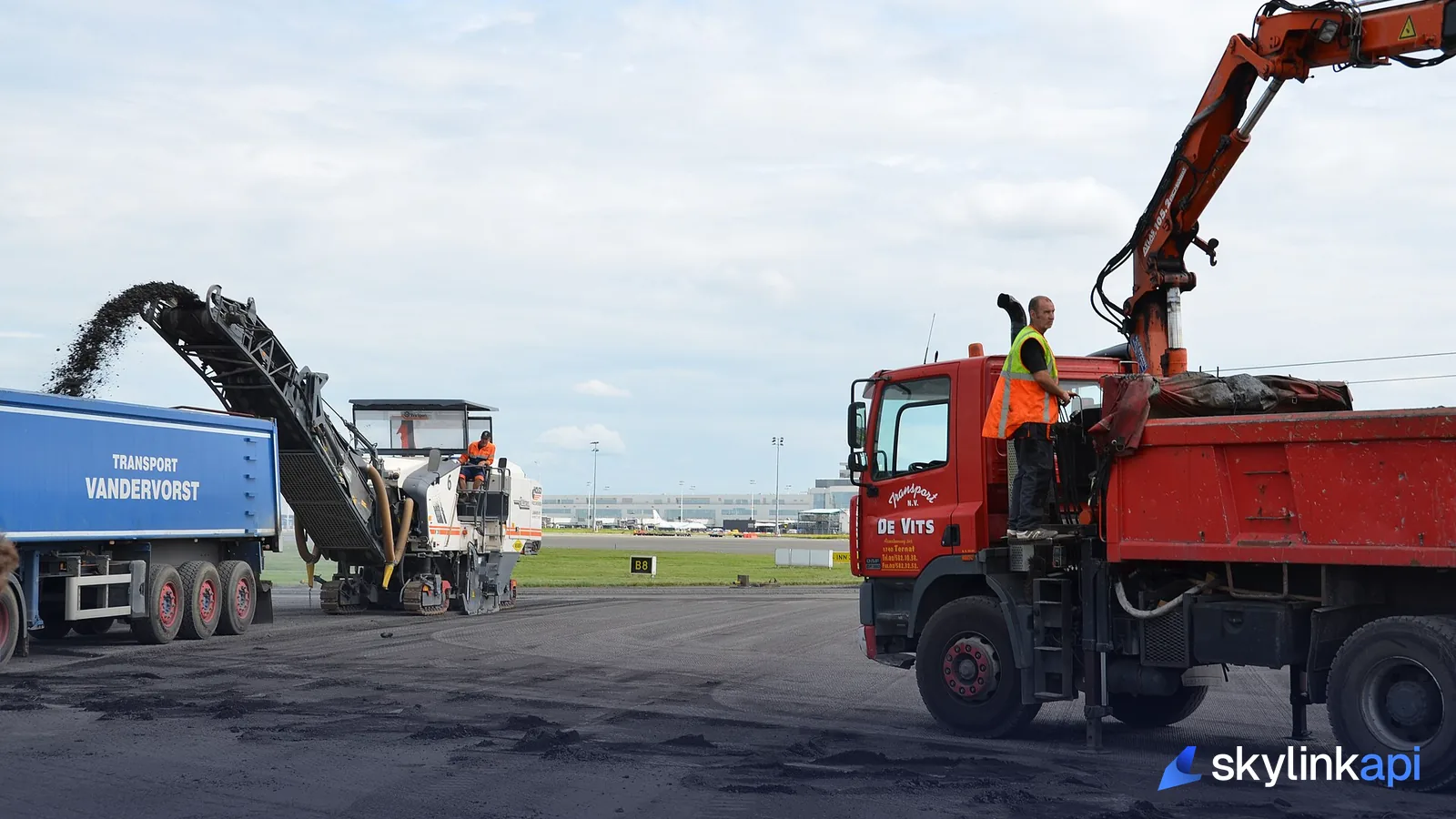 A milling machine resurfacing a runway — the kind of closure a NOTAM announces