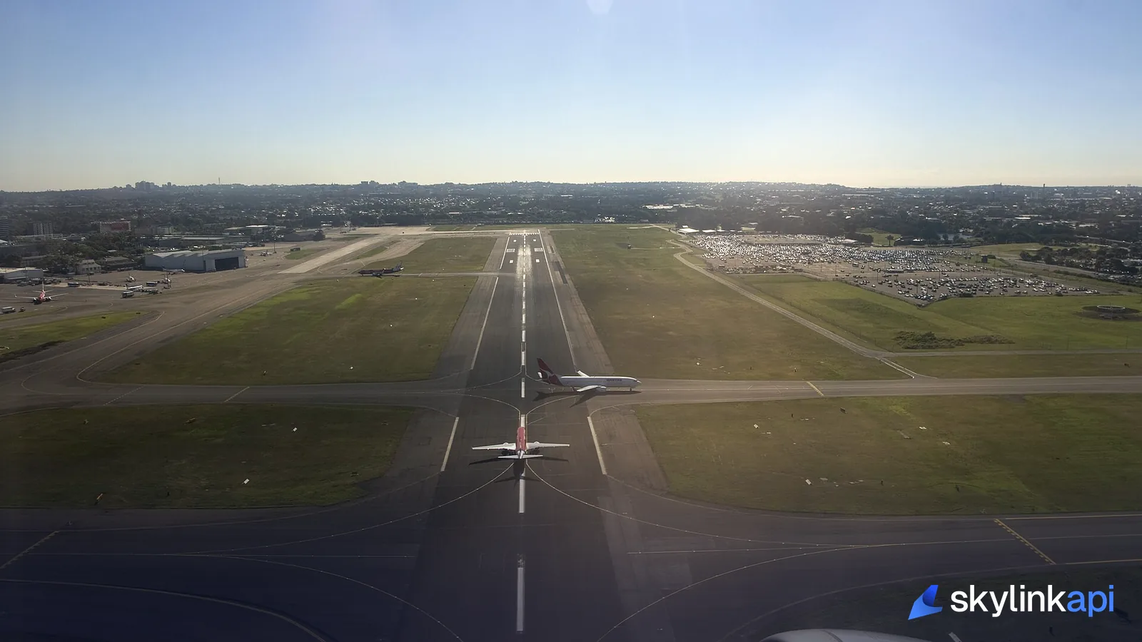 Runway and taxiway markings painted across the airport pavement