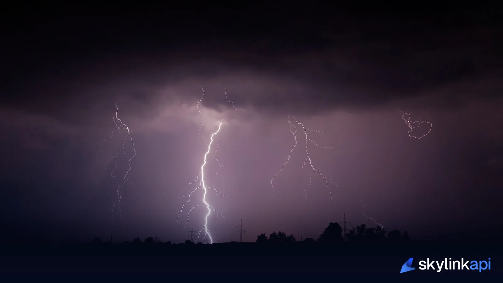 A lightning bolt striking down from a night storm