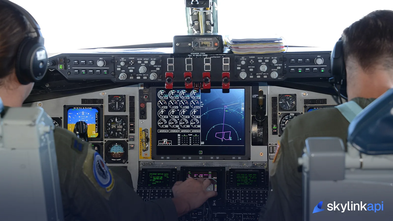 A glass cockpit flight deck, where the crew dials the transponder code