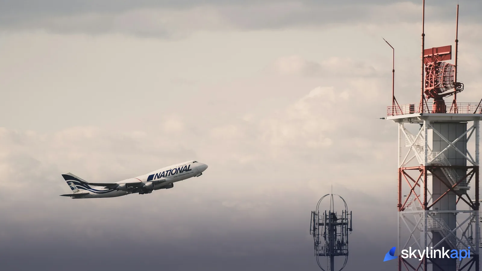 Large jetliner passing through clouds, the kind of aircraft that broadcasts its position via ADS-B