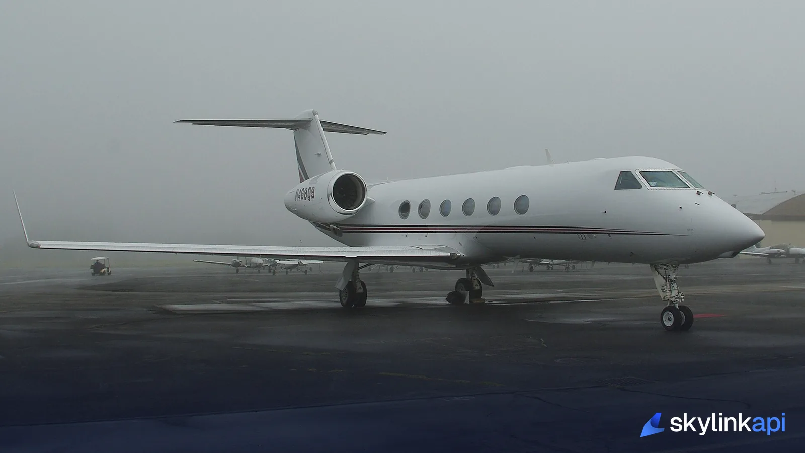 A business jet parked on the tarmac